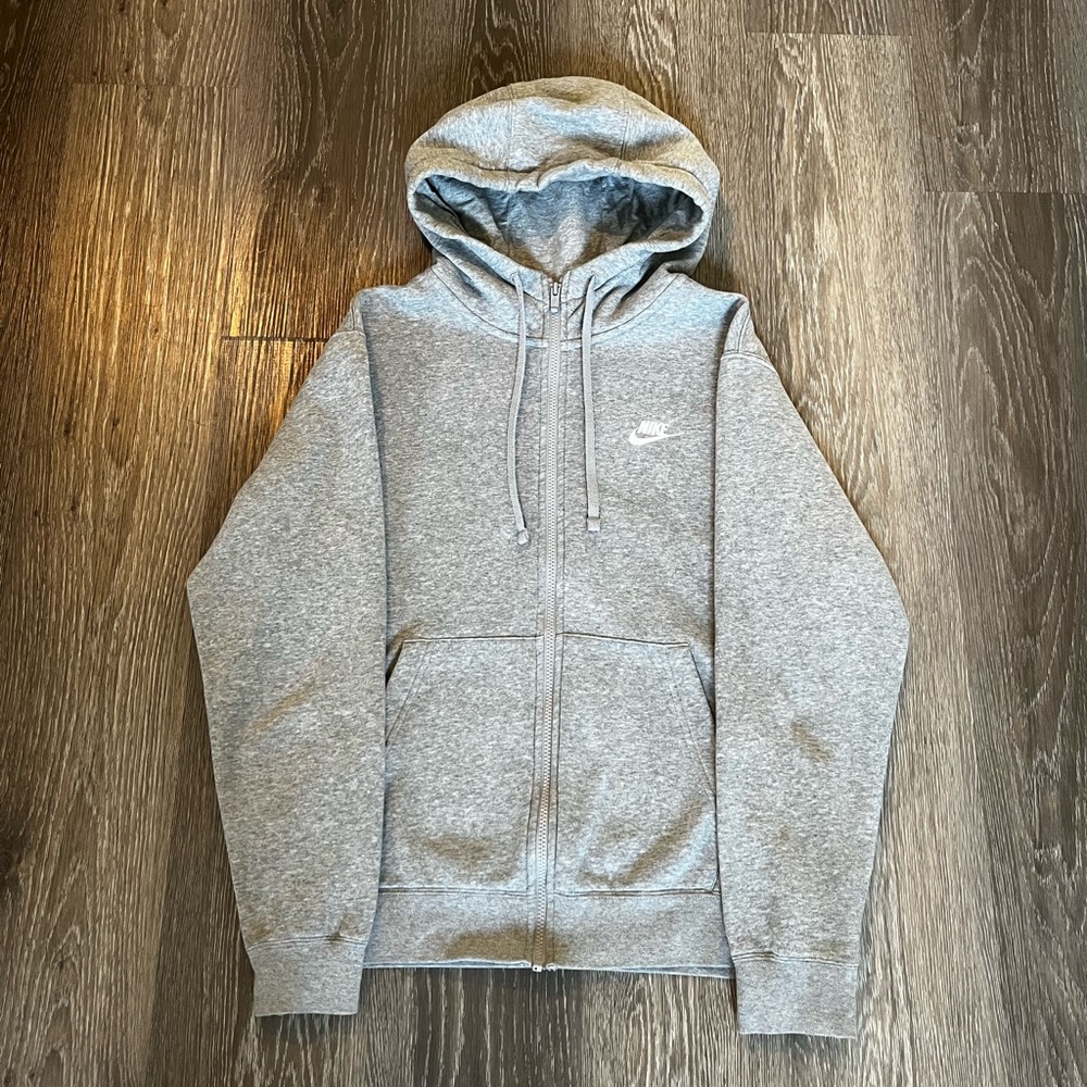 Nike’s Grey Full Zip Fleece Hoodie with Signature White Logo